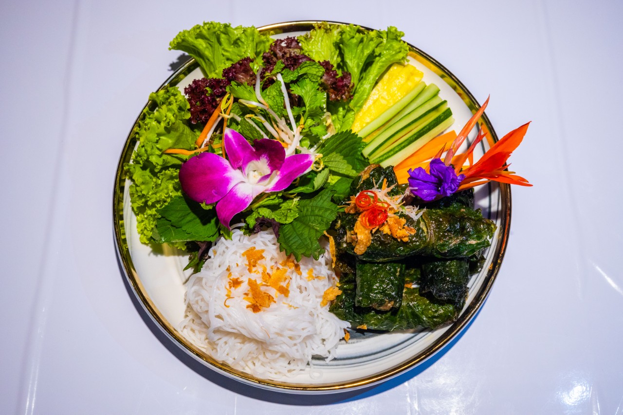 Grilled meat wrapped in betel leaves